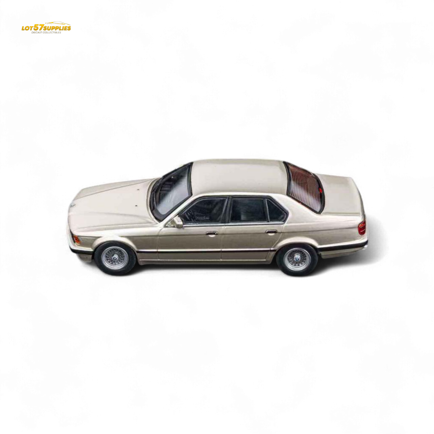 Gold beagle diecast model of BMW E32 7-Series sedan in 1:64 scale by Lot57Supplies, featuring detailed craftsmanship.