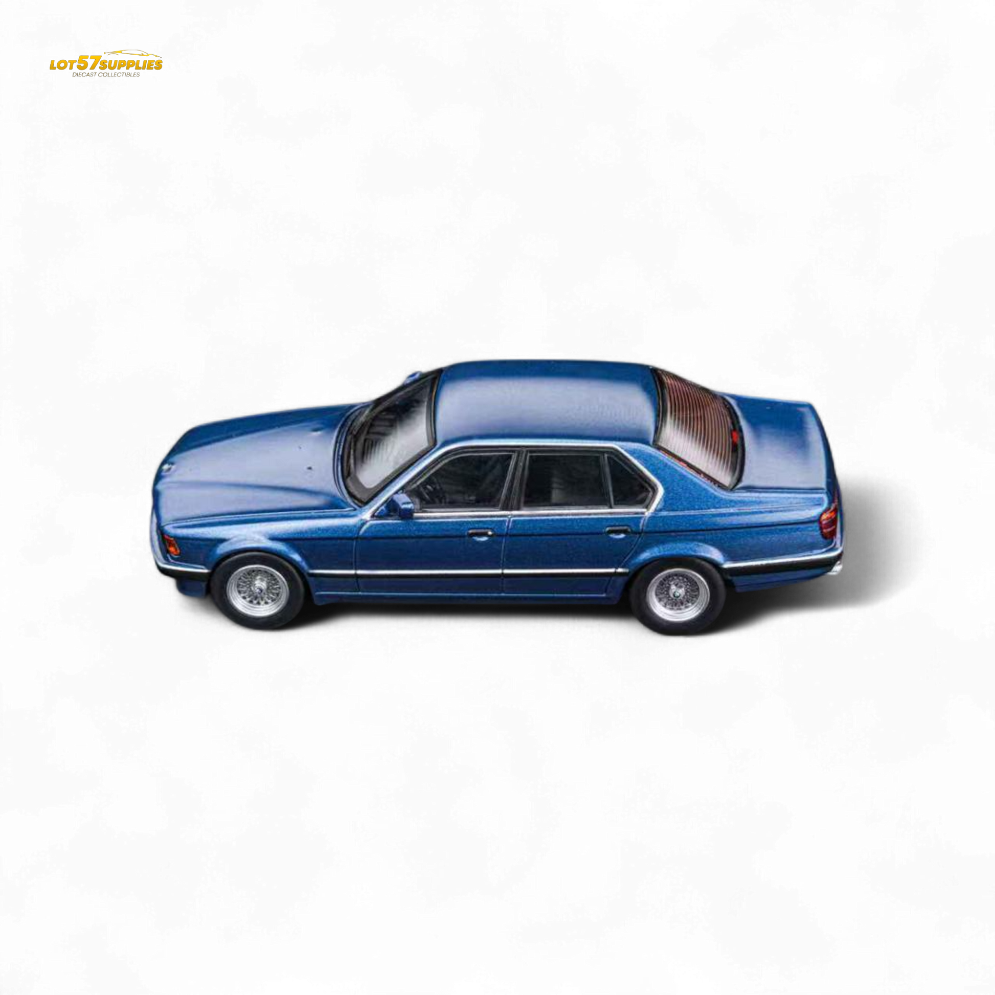 Miniature BMW E32 7-Series Sedan diecast model in Alpina Blue, 1:64 scale, detailed collectible by Lot57Supplies.