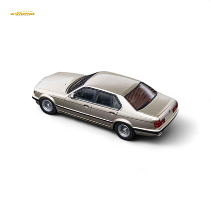 Gold 1:64 scale diecast BMW E32 7-Series sedan model in cashmere color by Lot57Supplies Diecast Shop.