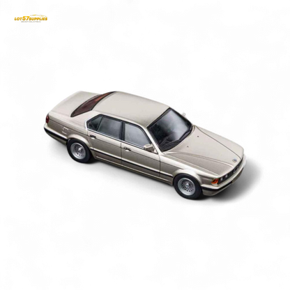 Gold Beagle 1:64 scale diecast model of BMW E32 7-Series sedan in cashmere color by Lot57Supplies Diecast Shop.