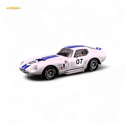 White Shelby Daytona 1:64 diecast car with blue racing stripes from Fine Works64, showcasing detailed exterior and sleek design.
