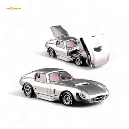 Silver Shelby Daytona diecast car in 1:64 scale by Lot57Supplies Diecast Shop, featuring chrome finish and detailed design.