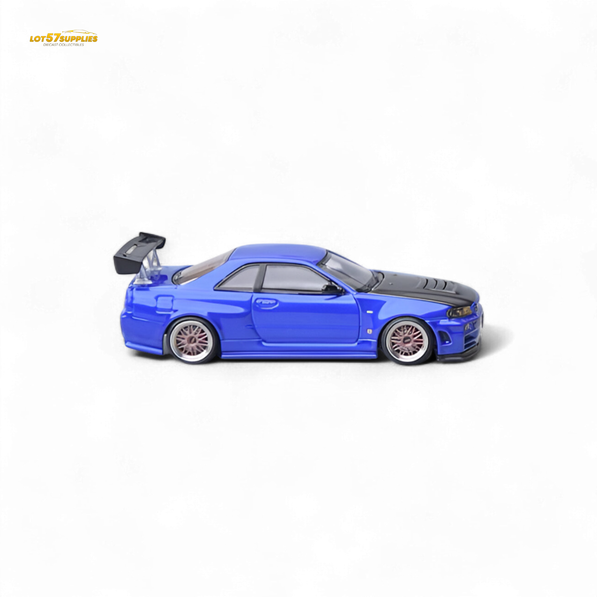 Nissan Focal Horizon Skyline GT-R R34 diecast model in Bayside Blue, 1:64 scale, featuring detailed exterior design and branding.