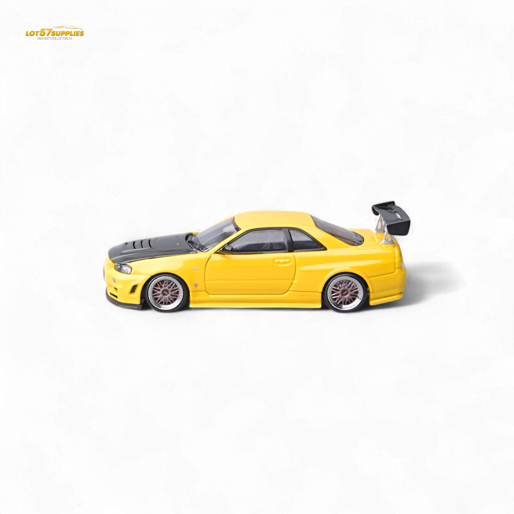 Yellow Nissan Skyline GT-R R34 Z-Tune diecast model with carbon hood, detailed 1:64 scale, from Lot57Supplies Diecast Shop.