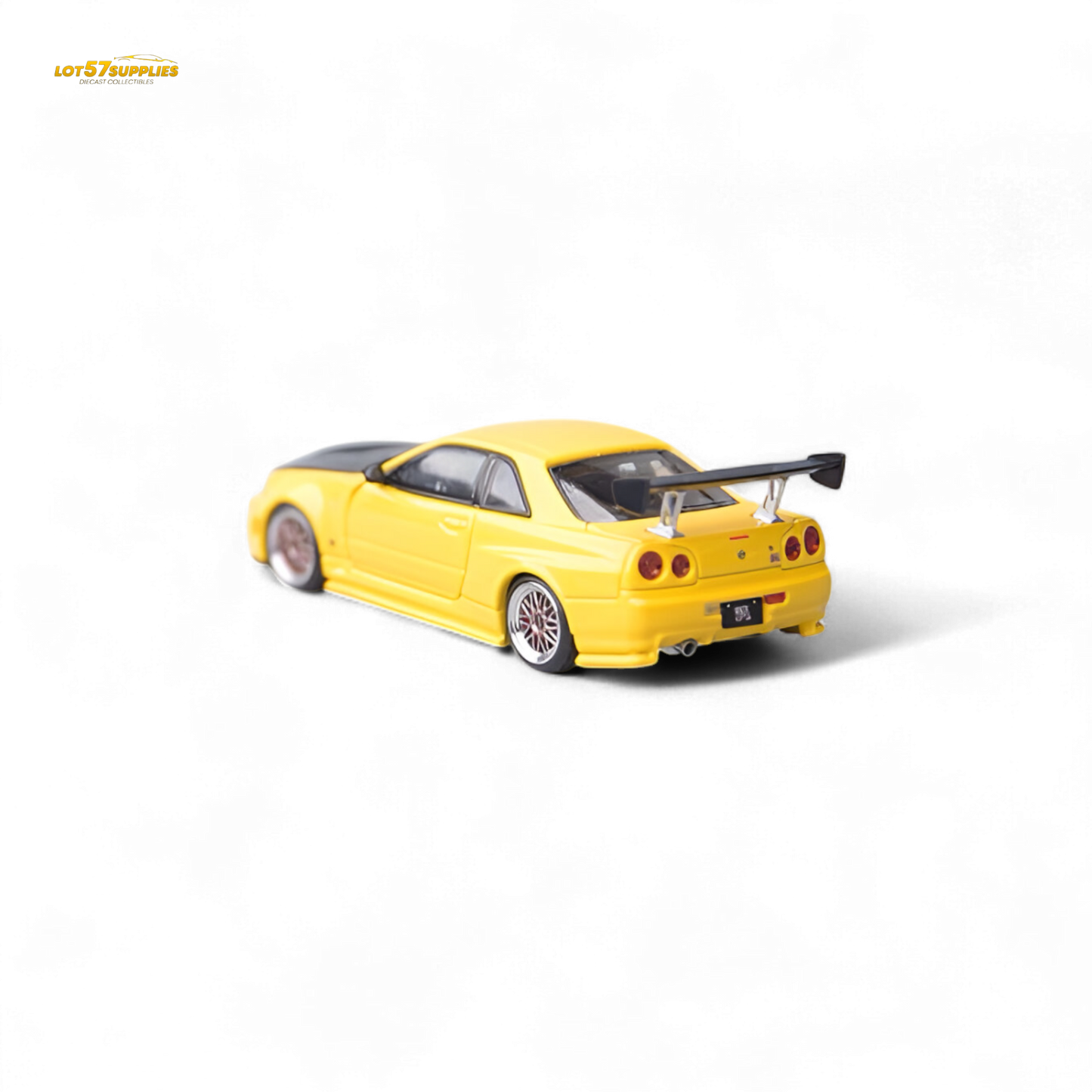 Yellow Nissan Skyline GT-R R34 Z-Tune diecast model with carbon hood, detailed replica from Lot57Supplies Diecast Shop.