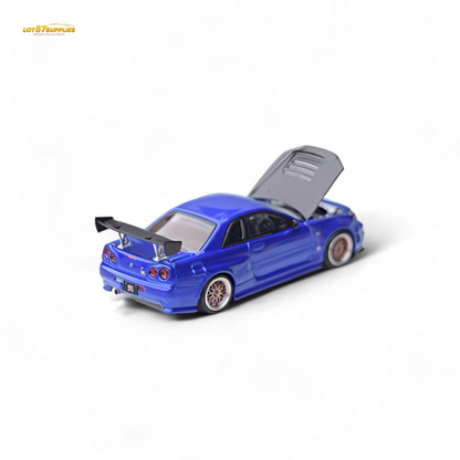 Nissan Focal Horizon Skyline GT-R R34 diecast car in Bayside Blue, 1:64 scale, featuring detailed exterior and sporty design.