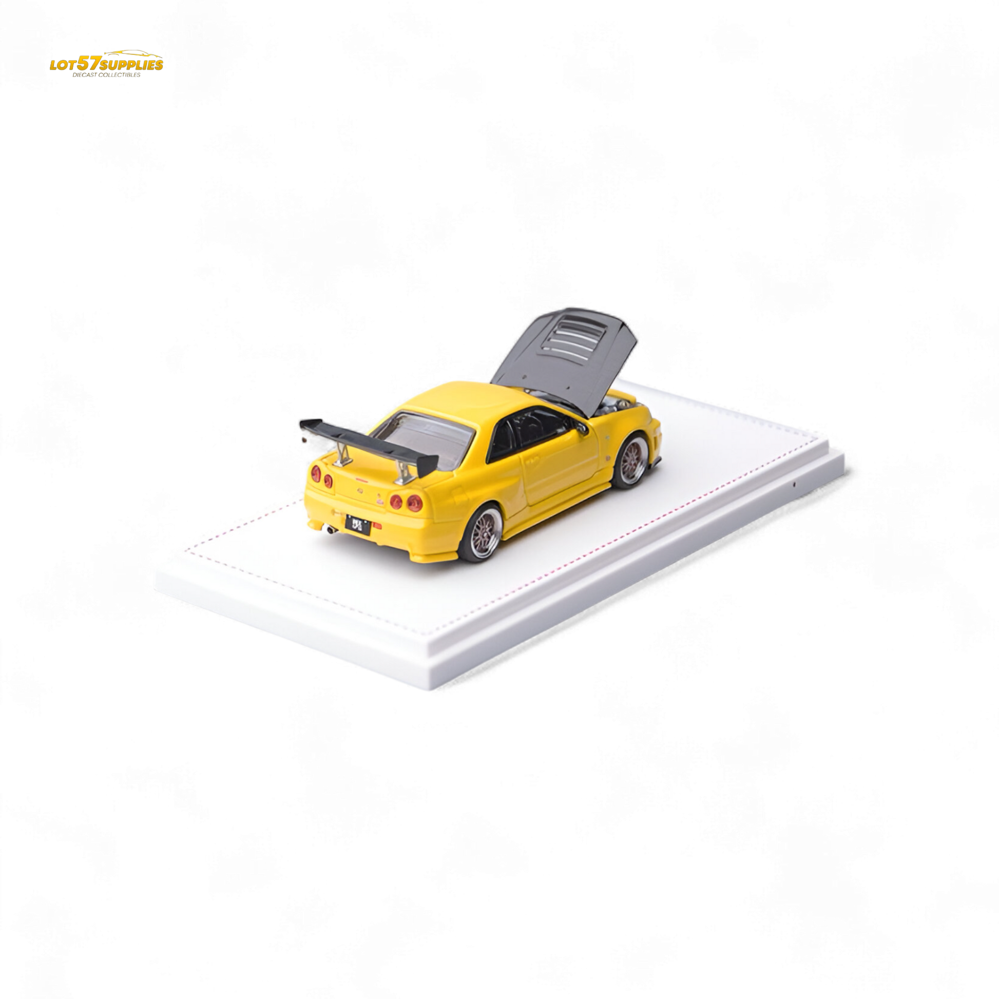 Yellow Nissan Skyline GT-R R34 Z-Tune diecast model with carbon hood, detailed 1:64 scale, crafted by Lot57Supplies Diecast Shop