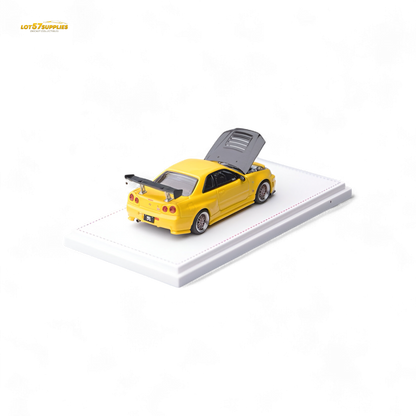 Yellow Nissan Skyline GT-R R34 Z-Tune diecast model with carbon hood, detailed 1:64 scale, crafted by Lot57Supplies Diecast Shop