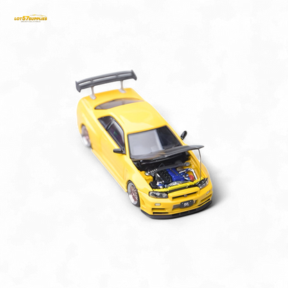 Yellow Nissan Skyline GT-R R34 Z-Tune diecast car with carbon hood, 1:64 scale, detailed model from Lot57Supplies Diecast Shop.