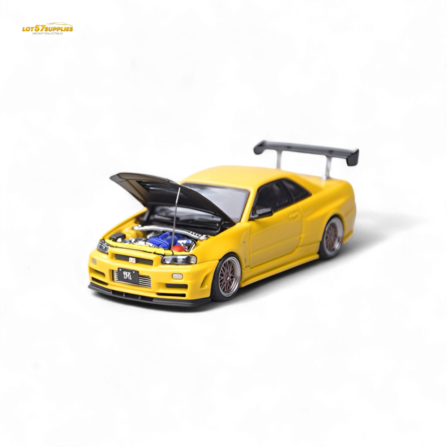 Yellow Nissan Skyline GT-R R34 Z-Tune diecast model with carbon hood, 1:64 scale, detailed miniature car by Lot57Supplies.