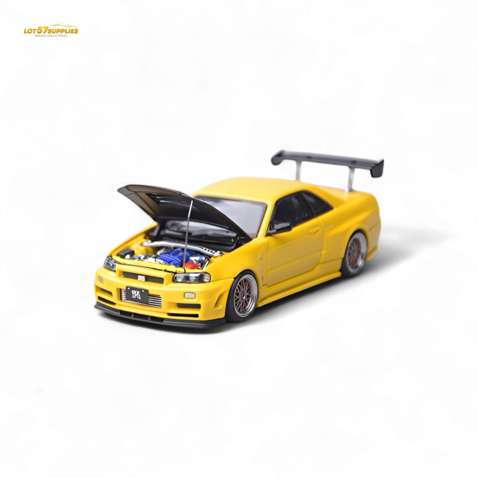 Yellow Nissan Skyline GT-R R34 Z-Tune diecast model with carbon hood, 1:64 scale, detailed miniature car by Lot57Supplies.