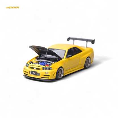 Yellow Nissan Skyline GT-R R34 Z-Tune diecast model with carbon hood, 1:64 scale, detailed miniature car by Lot57Supplies.
