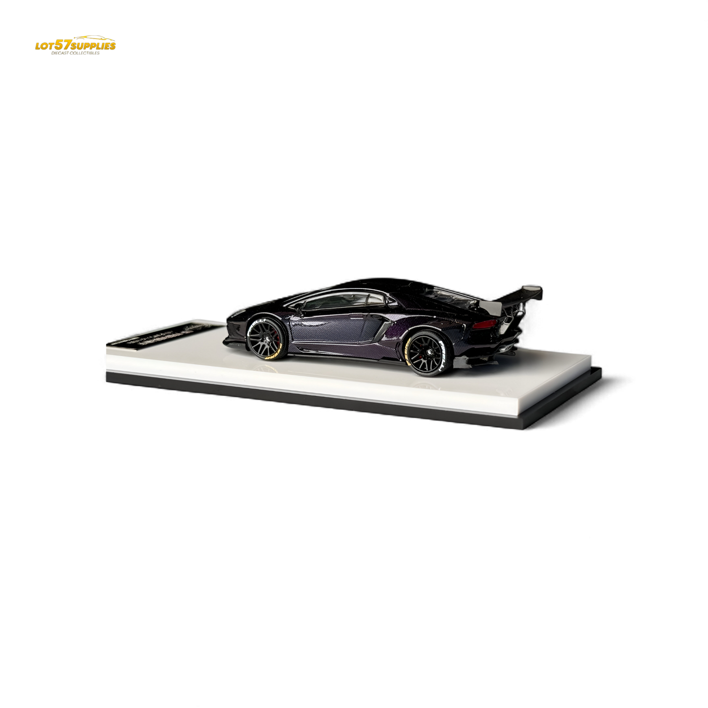 Purple Lamborghini Aventador LP700-4 diecast model in 1:64 scale with carbon fiber details, showcasing sleek design and detailed features.