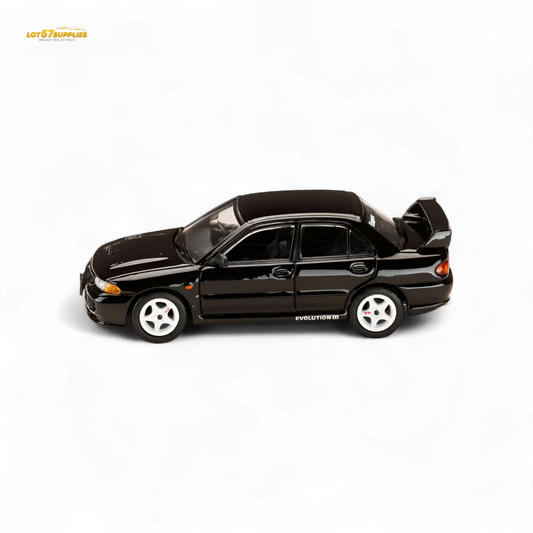 Black Mitsubishi Lancer Evo III diecast model by Hobby Japan, 1:64 scale, detailed miniature car for collectors.