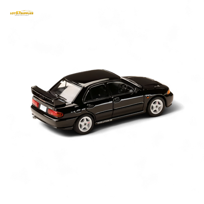 Black Mitsubishi Lancer Evo III diecast model car by Hobby Japan, detailed 1:64 scale collectible for enthusiasts.