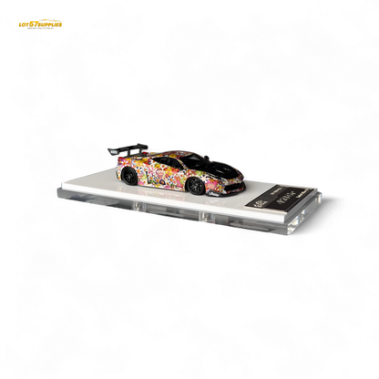 Dark glow-in-the-dark 1:64 Ferrari Flame Ferrari 458 GT LB Wide-Body diecast with Takashi Murakami Flower livery, resin model.