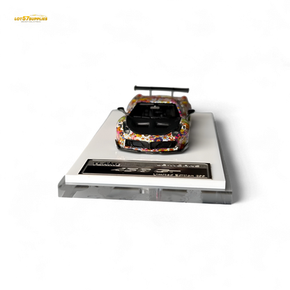 Dark glow-in-the-dark 1:64 resin Ferrari Flame Ferrari 458 GT LB wide-body diecast with Takashi Murakami Flower livery.