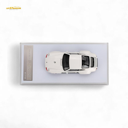 Bright white Zincit model Porsche 911 Singer DLS diecast car in 1:64 scale, detailed miniature with realistic features.