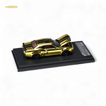 Gold 1:64 scale Dodge Challenger SRT Hellcat diecast model by Stance Hunters, detailed view of the collectible car.