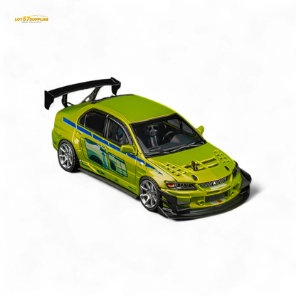 Green Mitsubishi Lancer Evo 9 FNF Bryan diecast model in 1:64 scale with detailed Bryan livery, showcasing sporty car design.
