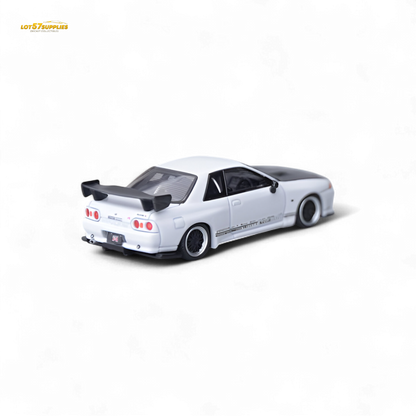 White Nissan Skyline GT-R R32 diecast model featuring Top Secret modifications, 1:64 scale from Lot57Supplies Diecast Shop.