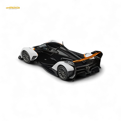Black and white CM Model McLaren Solus GT diecast car in 1:64 scale, detailed miniature sports car, crafted by Lot57Supplies Diecast Shop.