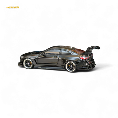 Miniature BMW M4 G82 diecast model with widebody kit in bright black, detailed 1:64 scale replica from Lot57Supplies Diecast Shop