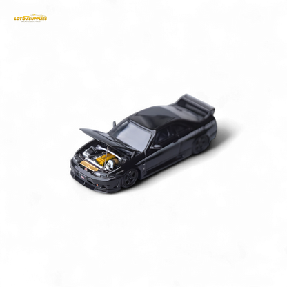 Black Nissan Skyline GT-R R33 Nismo 400R diecast model, 1:64 scale, featuring detailed exterior design and branding.