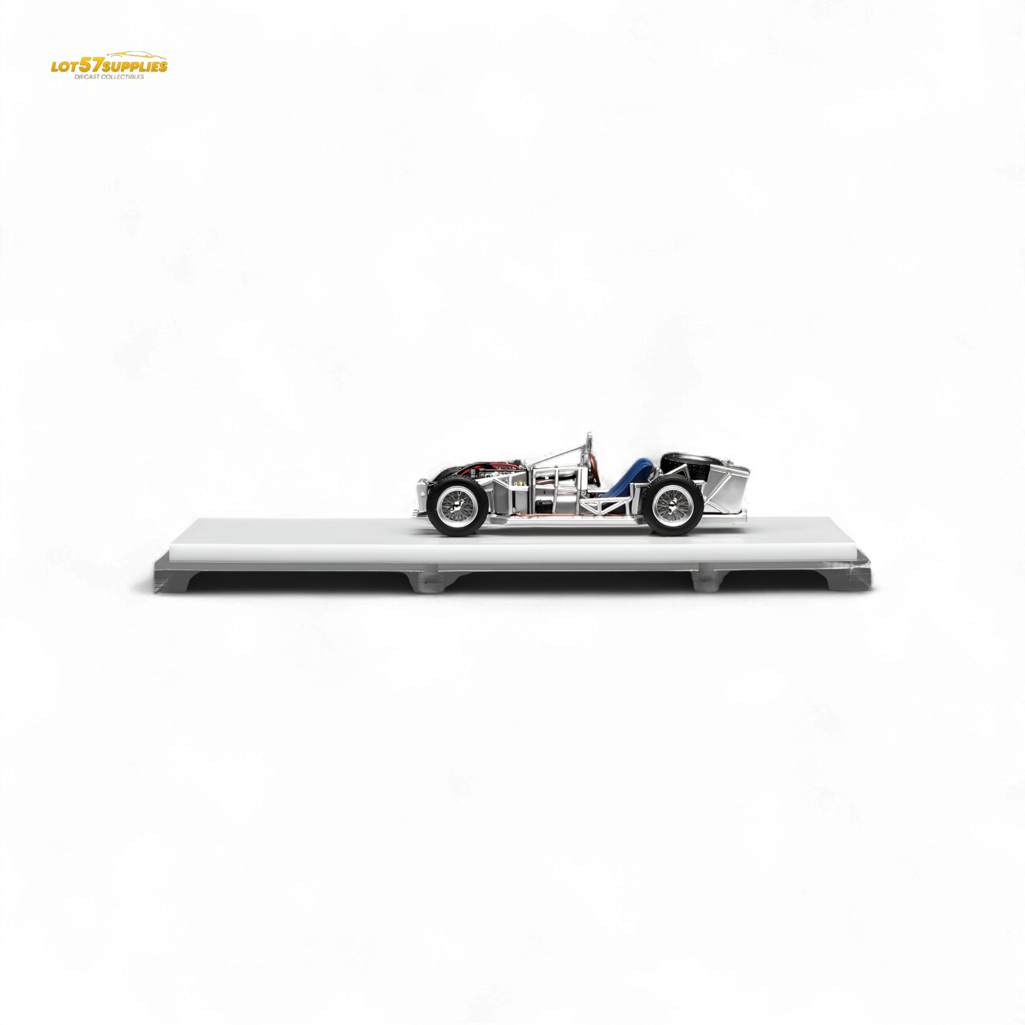 Detail of a 1:64 scale Motorhelix Spaceframe Birdcage diecast model with engine, showcasing intricate design and craftsmanship.