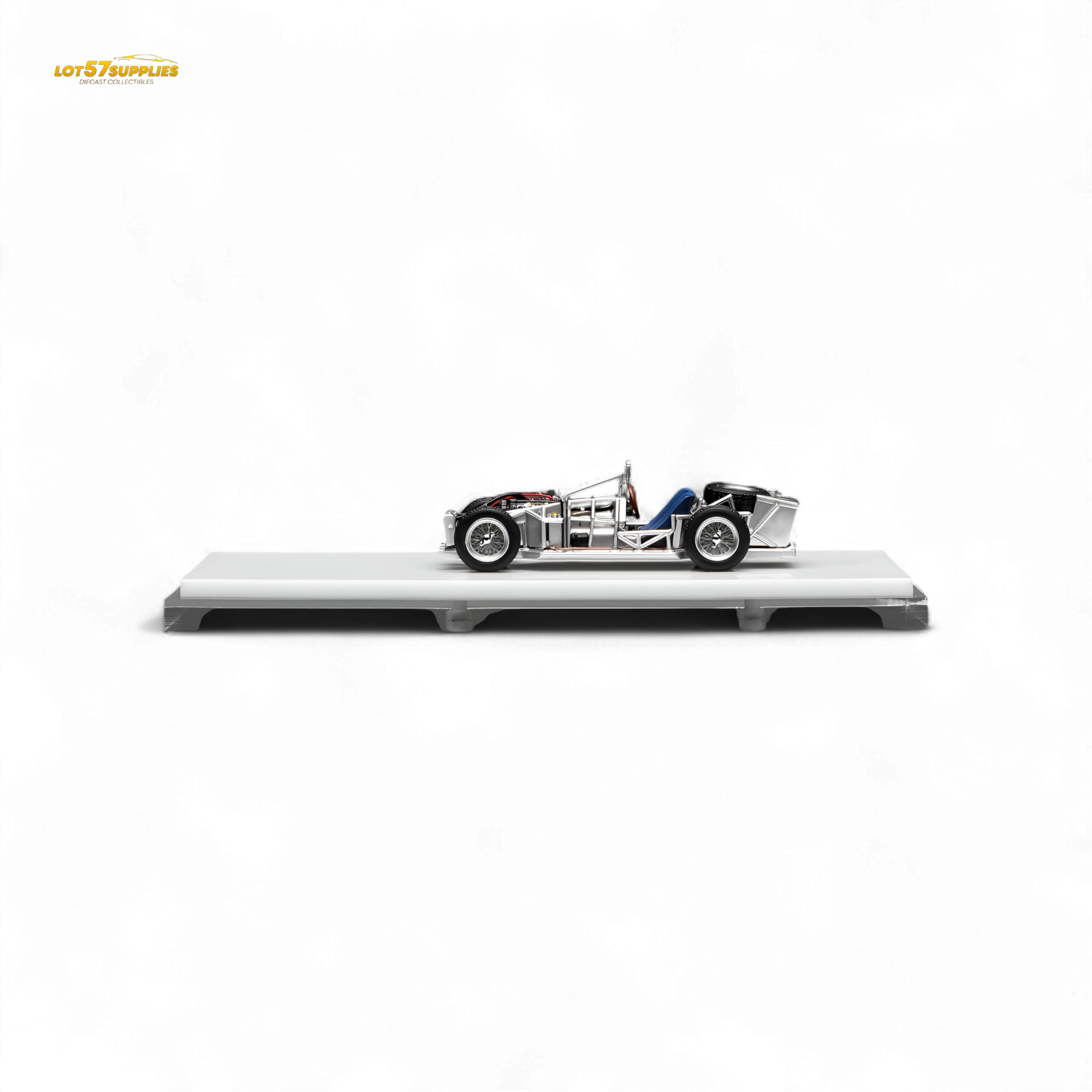 Detail of a 1:64 scale Motorhelix Spaceframe Birdcage diecast model with engine, showcasing intricate design and craftsmanship.