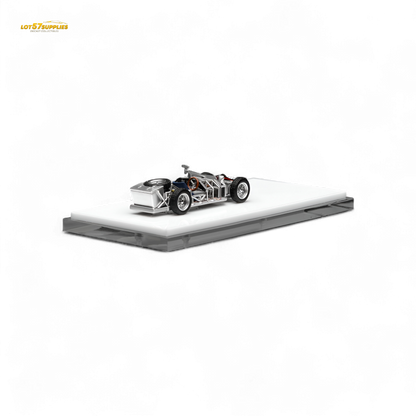 Detailed image of a 1:64 scale Motorhelix Spaceframe Birdcage diecast model with engine from Lot57Supplies Diecast Shop.