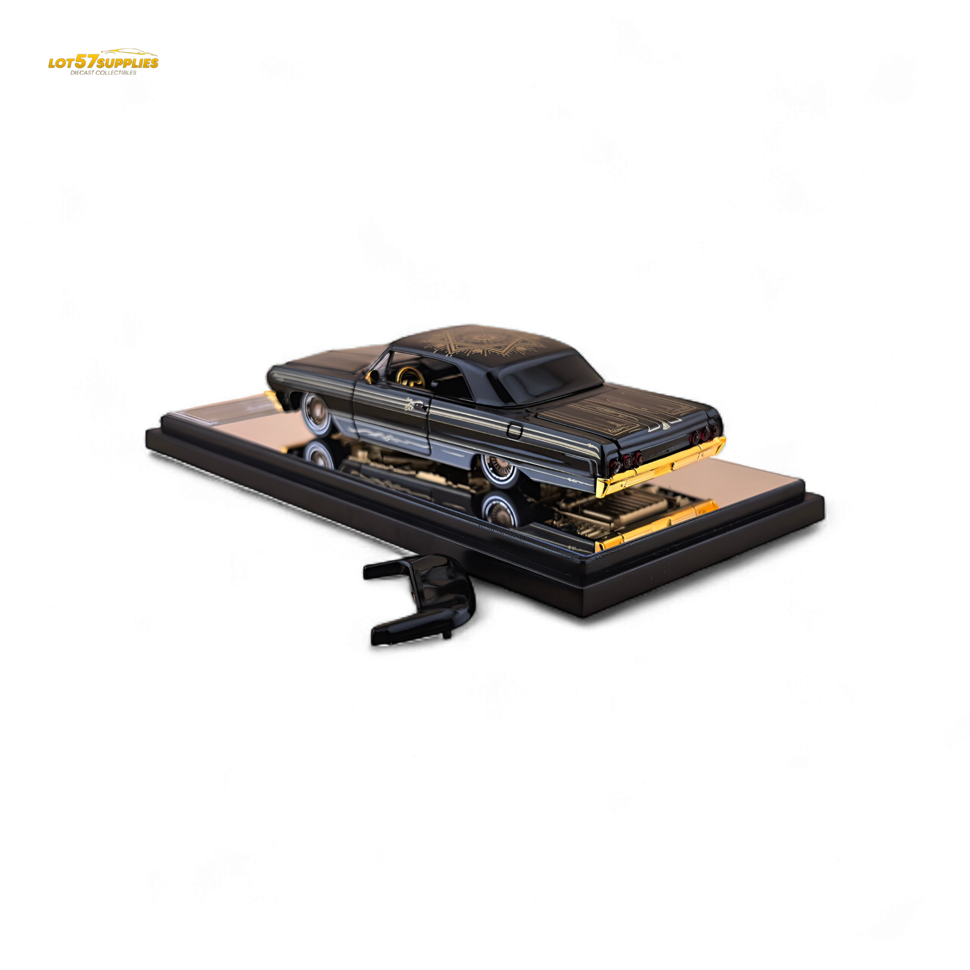 Detailed image of a 1:64 Chevrolet Impala lowrider diecast model with black and gold livery by Lot57Supplies Diecast Shop.