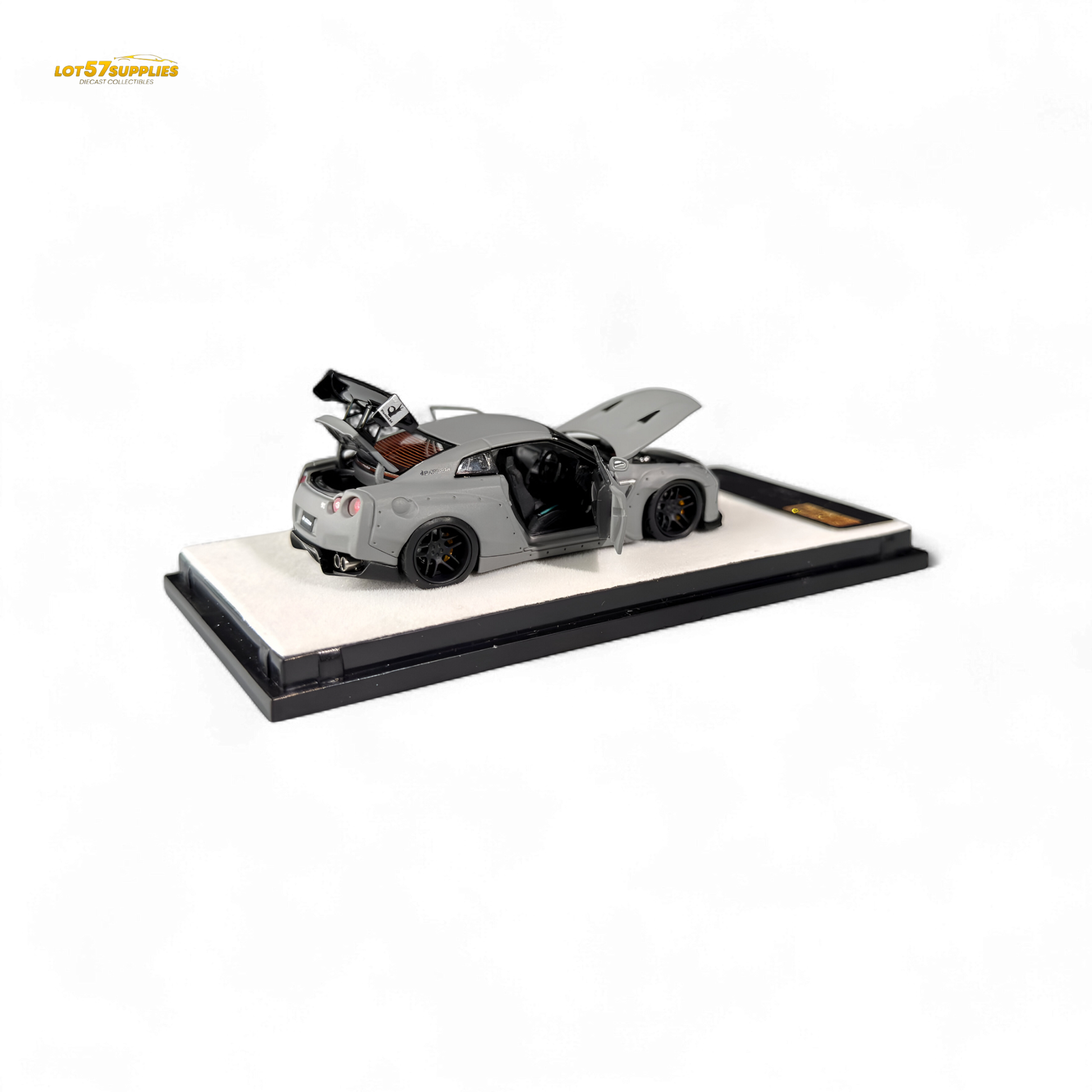 Diecast Nissan PGM Rocket Bunny R35 in combat grey, 1:64 scale, featuring detailed design and aerodynamic body.