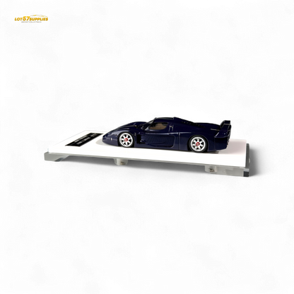 Blue Maserati MC12 Stradale Corsa diecast model in 1:64 scale, detailed blue carbon design from Lot57Supplies Diecast Shop.