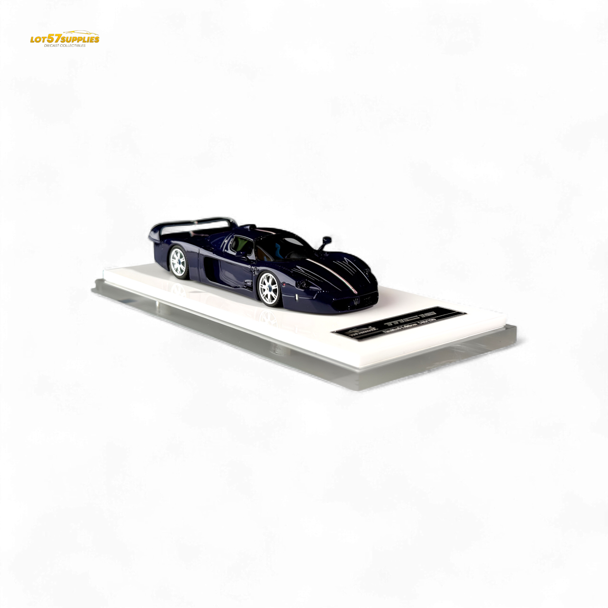 Blue YM Model Maserati MC12 Stradale Corsa diecast car in 1:64 scale, detailed miniature with blue carbon accents.