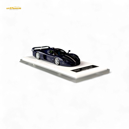 Blue YM Model Maserati MC12 Stradale Corsa diecast car in 1:64 scale, detailed miniature with blue carbon accents.