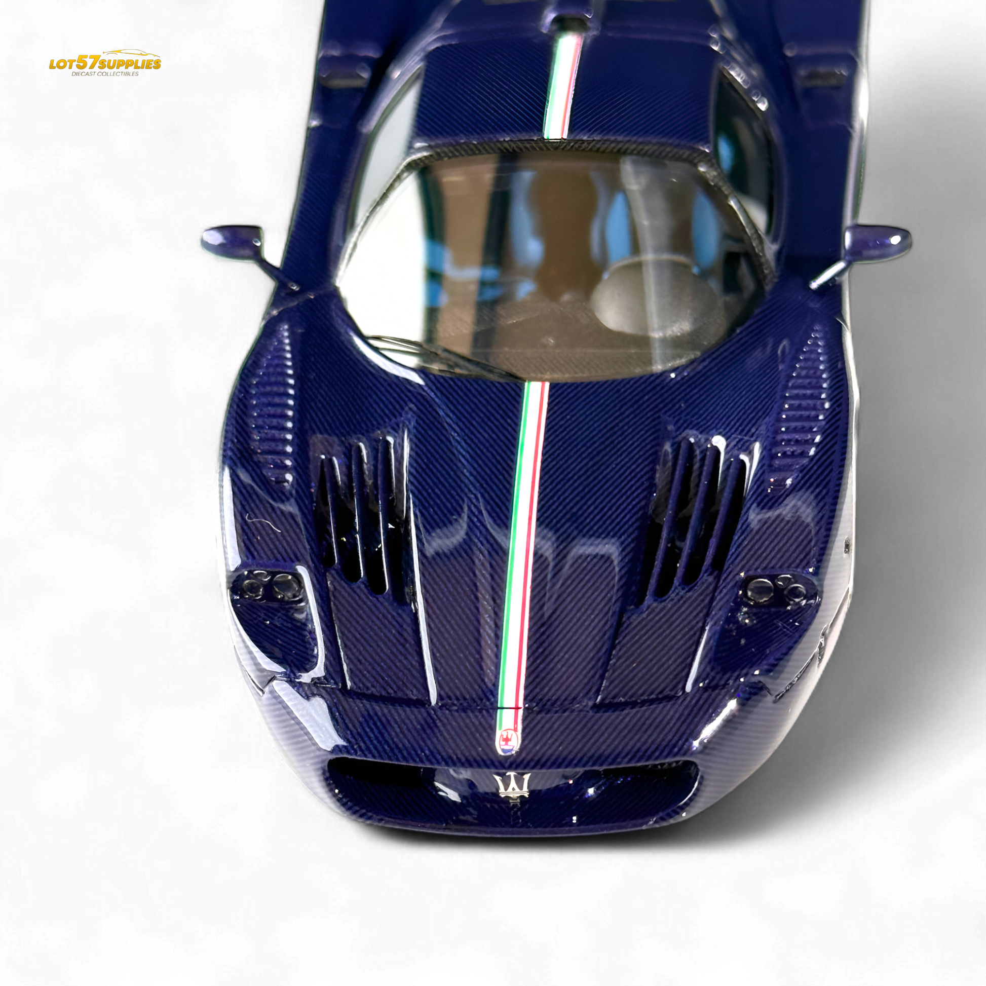Blue Maserati MC12 Stradale Corsa diecast model in 1:64 scale, detailed blue carbon fiber design from Lot57Supplies Diecast Shop