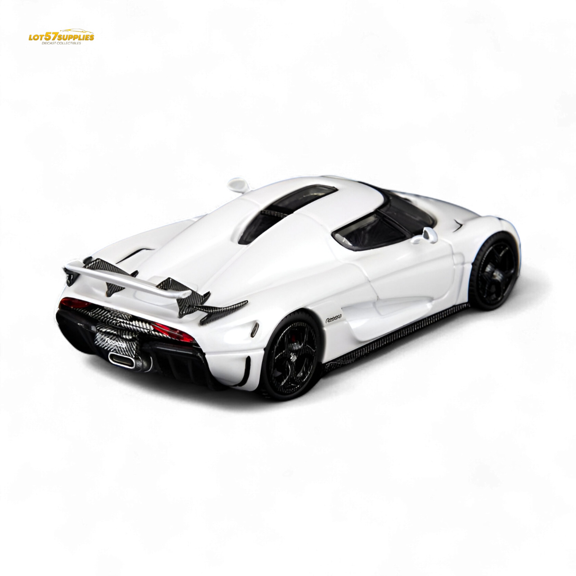 White 1:64 scale Regera model car from SC Art Regera collection, showcasing detailed design and pearl white finish.