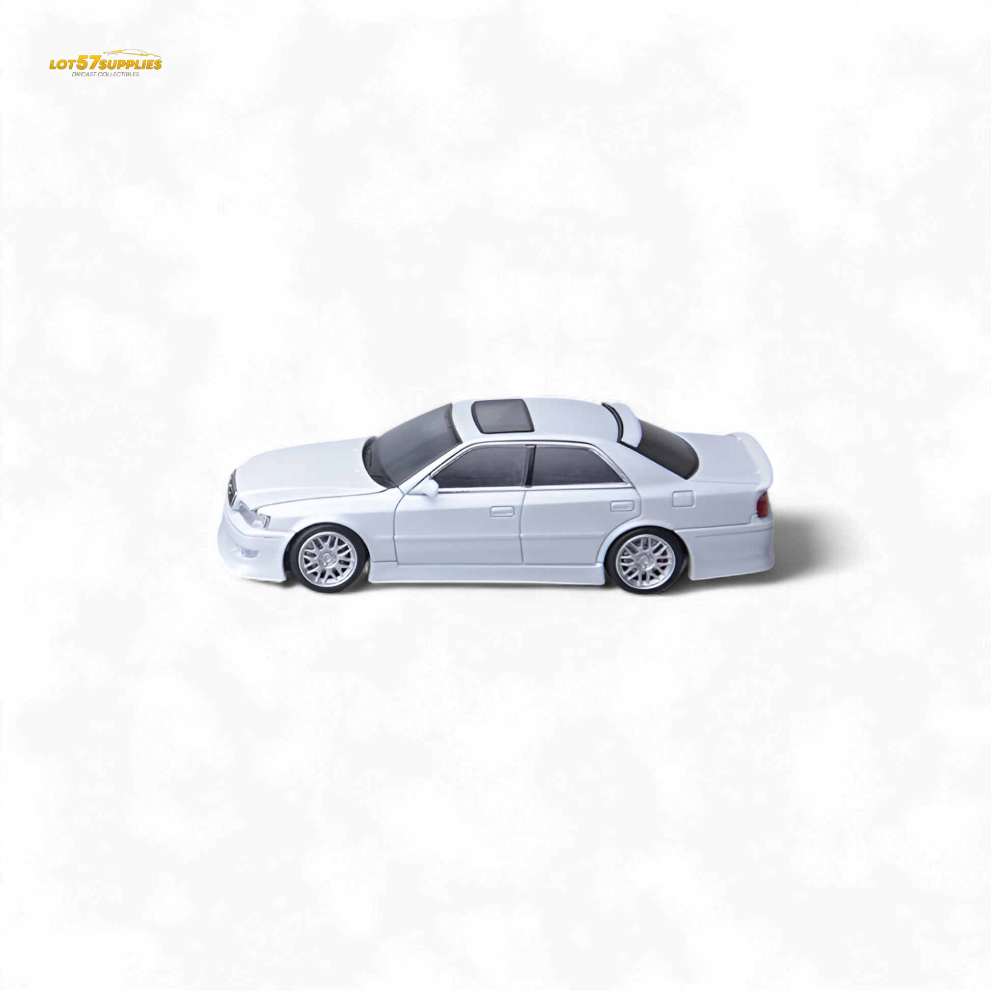 Pearl white Toyota JZX100 diecast model car, 1:64 scale by Lot57Supplies Diecast Shop, detailed miniature vehicle.