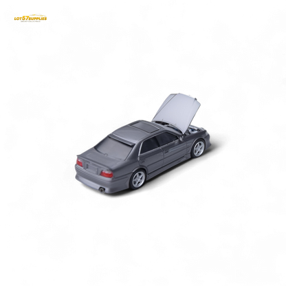 Gunmetal gray Toyota JZX100 diecast model car by Lot57Supplies, detailed 1:64 scale toy vehicle for collectors.