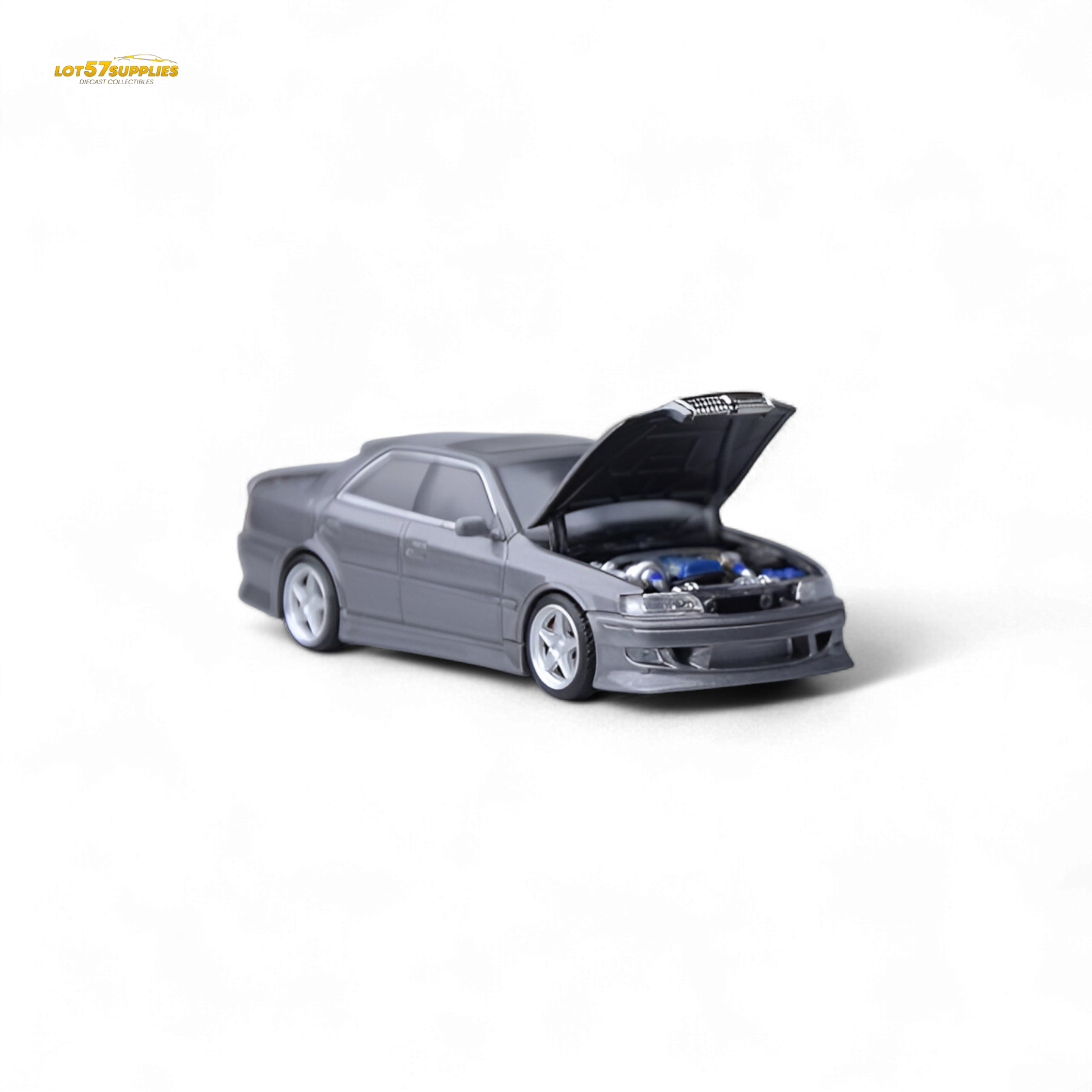 Gunmetal gray Toyota JZX100 diecast model car in 1:64 scale by Lot57Supplies Diecast Shop, detailed view of the miniature vehicle.