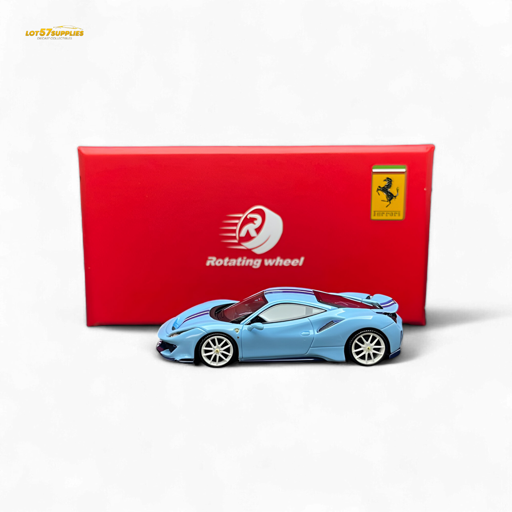 Silver Ferrari 488 Pista diecast model wheel spinning on a blue Ferrari 488 Pista toy car.