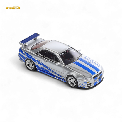 Diecast Nissan Skyline GT-R R34 Z-Tune model by Lot57Supplies, detailed 1:64 scale with vibrant blue finish and realistic features.