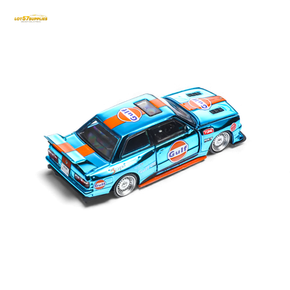 Diecast BMW E30 model car by Lot57Supplies Diecast Shop, featuring Demon King Auto Gulf livery in 1:64 scale.
