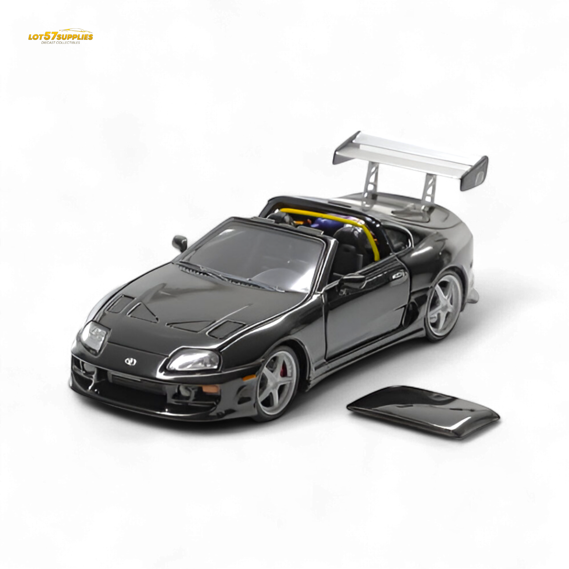 Black Toyota Supra Targa diecast model in 1:64 scale, featuring sleek design and detailed exterior.