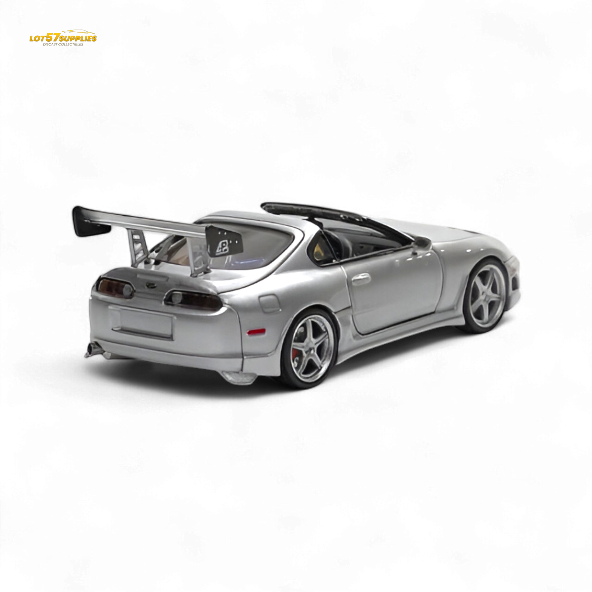 Silver 1:64 scale Toyota Supra Targa diecast car, fast speed model from Lot57Supplies Diecast Shop, shown from side view.