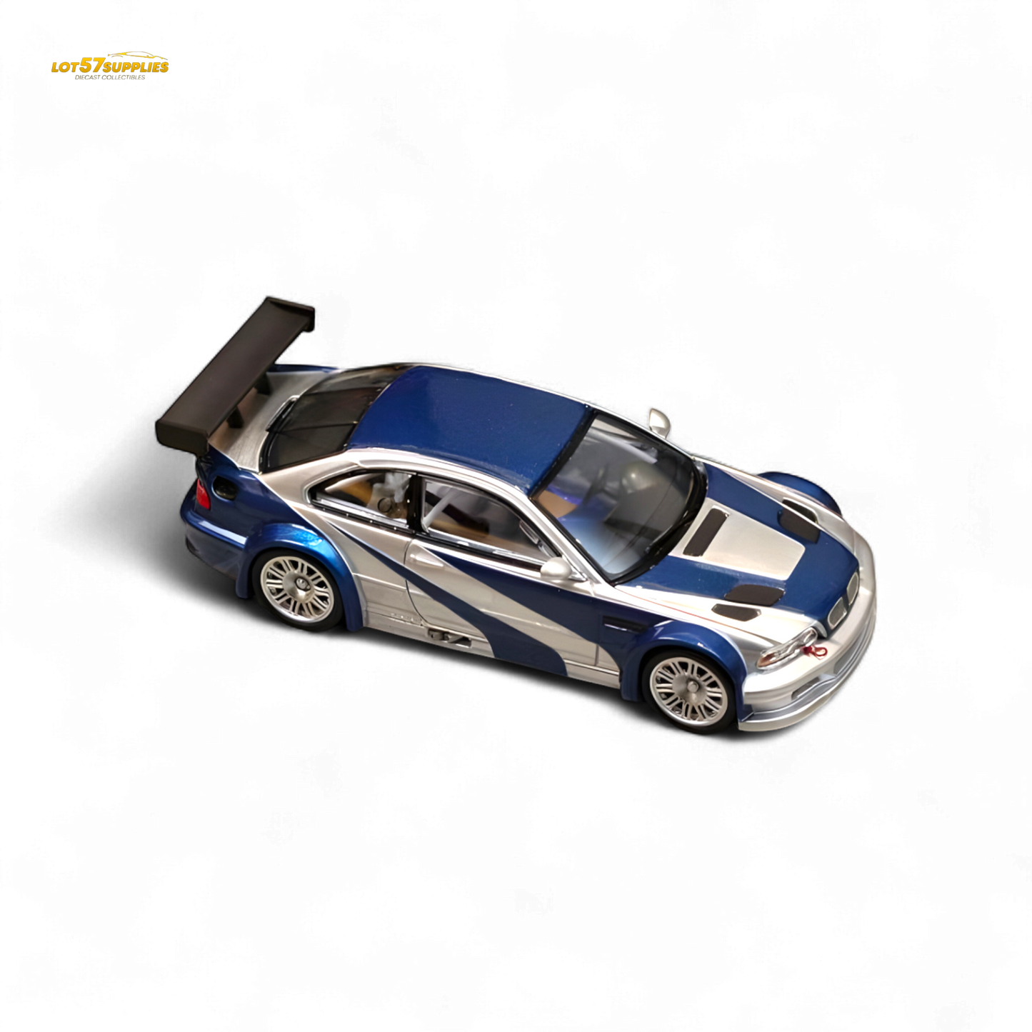 Silver-blue BMW E46 M3 GTR diecast model car in 1:64 scale by Lot57Supplies, detailed miniature replica on a plain background.