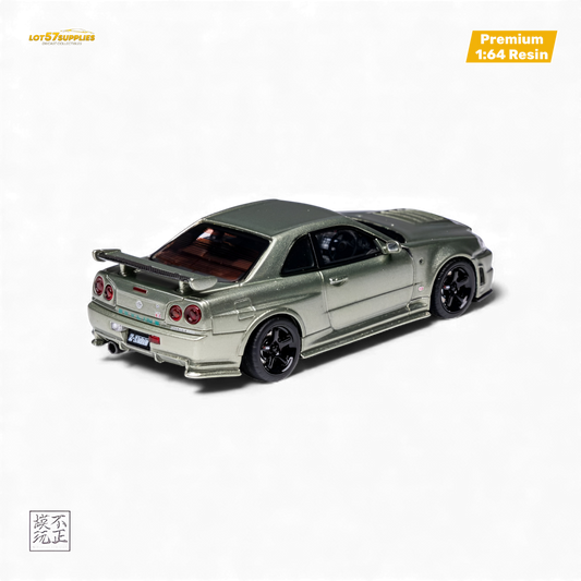 Nissan Skyline GT-R R34 NISMO Z-TUNE diecast model in Millennium Jade, 1:64 scale, displayed from a side angle.
