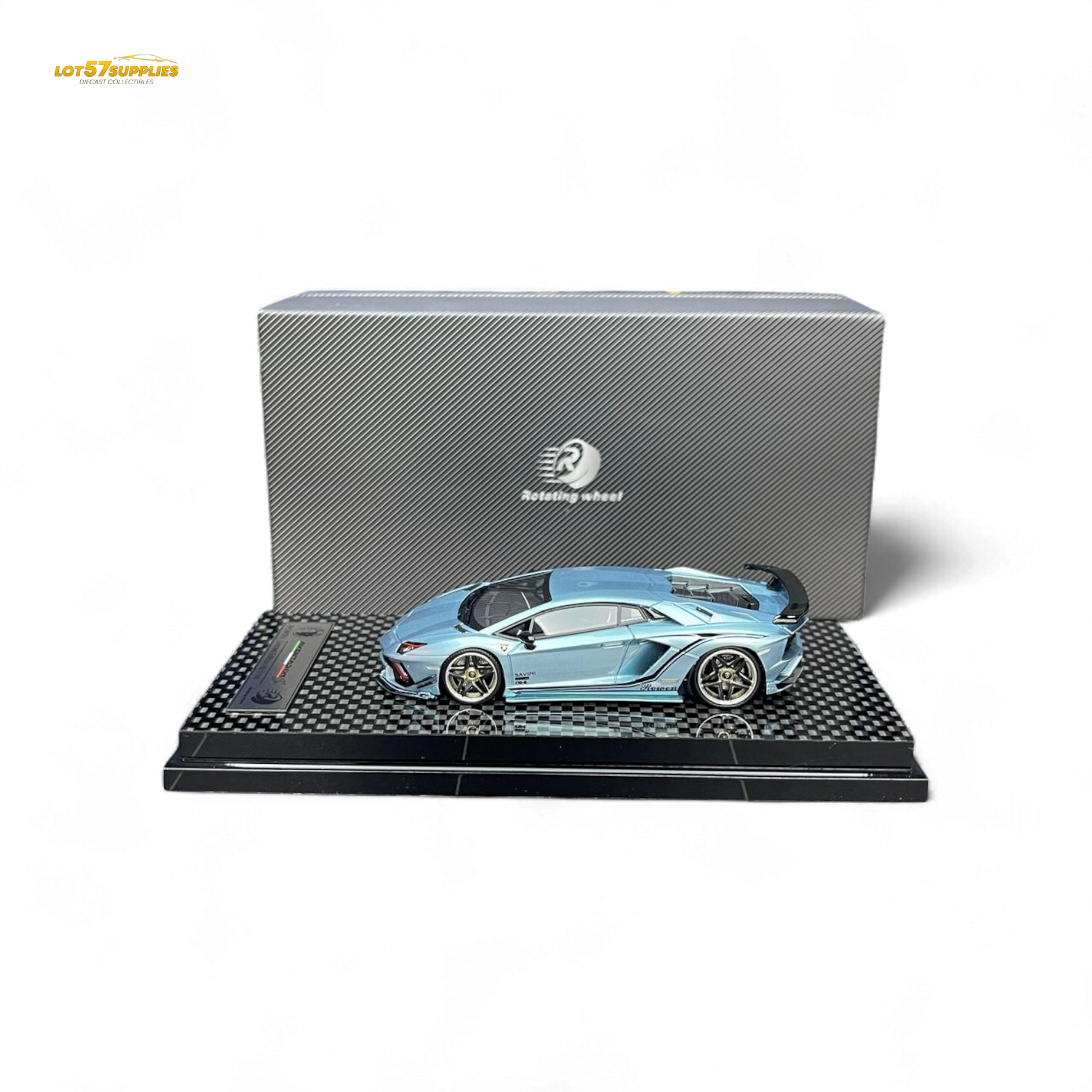 Ice blue Lamborghini Aventador S 1:64 diecast wheel rotating model by Lot57Supplies Diecast Shop, showcasing detailed Lamborghini replica.