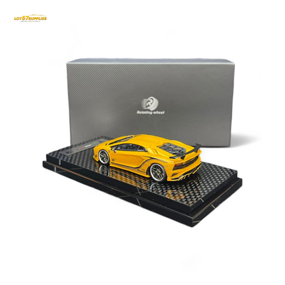 Yellow Lamborghini Aventador S 1:64 diecast model wheel rotating with detailed design and realistic features.
